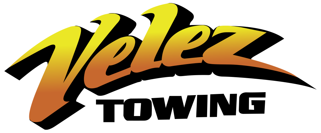 Velez Towing logo